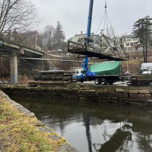 The Rockport footbridge, a pedestrian byway across the Goose River at Rockport Harbor, is removed from service Dec. 29. (Photo courtesy Rockport Harbor Facebook page)