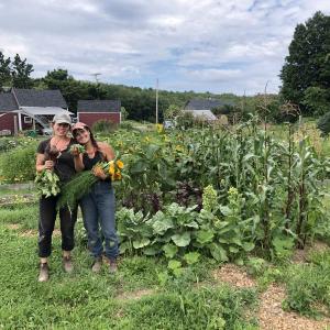 Community gardeners April Messier and Lily Carlisle-Reske at Erickson Fields. (Photo courtesy Aaron Englander)
