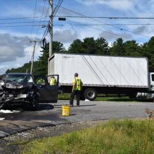 One branch of the Western Road and Camden Road intersection was closed Saturday morning, Aug. 19, 2023 after a crash involving a delivery truck and a passenger car. (Photo by Sarah Thompson)