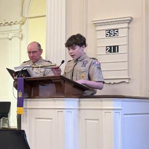 First Class Scout Zachary Mason leading the Prayer of Shared Acknowledgement and the Prayer of Confession alongside Scoutmaster Weber. (Photo courtesy Chuck Mahaleris)