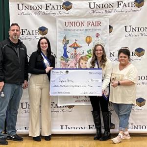 From left to right, Union Fair President Matt Elwell, 2023 Maine Wild Blueberry Crown Princess Kylie Blake, 2023 Maine Wild Blueberry Queen Jaycie Brown, 2024 Union Fair Poster Contest winner Sylvia Percy. (Photo courtesy Rick Butler)