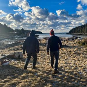 On Isle au Haut, from left to right, John DeWitt and the Mission’s Director of Island Services Douglas Cornman walk Head Harbor debris field. (Photo courtesy Maine Seacoast Mission)