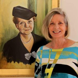 Ruth Monsell and her portrait of Frances Perkins. (Photo courtesy Ruth Monsell)