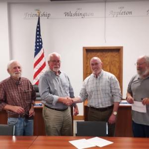 Knox County Commissioner Richard Parent, Interim Administrator Gordon Page, Richard "Lance" Govang and County Commissioner Ed Glaser. (Photo by Chris Wolf)