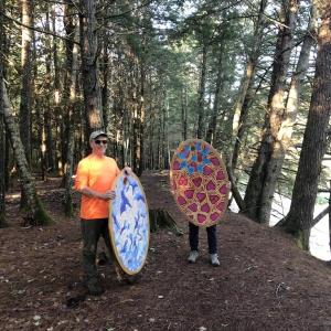 Peter Walls and Allegra Kuhn install their work at Stover Preserve during their 2024 Art Gone Wild Residency. (Photo courtesy Waterfall Arts)