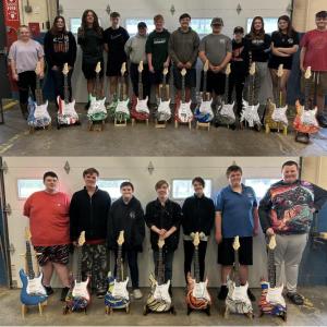 Students from Waldo County Technical Center's ESP and Strive Programs show the guitars they built and then painted with the Auto Collision and Composites Program. (Photo courtesy Waldo County Technical Center)
