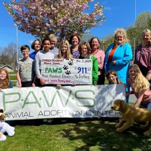 Left to right: Madilynn Lusca, Thomas Kunkel, George Johns, Adassa Palmer, Allison Parker, PAWS staff; Casey Belcher; Jaime Stone, CRMS Principal; Reverie Dyer; Gretchen Kuhn, CRMS Nurse; Nikole Seeger, CRMS Assistant Principal, Layla Novacek, Aria Madeira; and Gwendolyn Hudson, PAWS staff (Photo by Marsha Norwood)