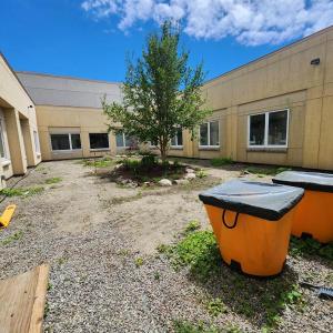 Work has begun to transform the courtyard gardens outside Pen Bay Medical Center’s Special Care Unit. When completed later this summer, the gardens will have new stone pavers, benches and planters. (Photo courtesy Pen Bay Medical Center)