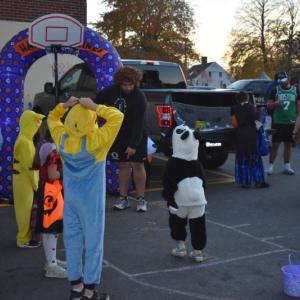 Children at the Flanagan Center try their hand at taking foul shots. (Photo by Sarah Thompson)