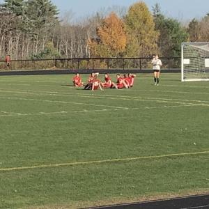 Camden Hills Girls Varsity Soccer Team taking a rest. (Photo by Eric Lear)