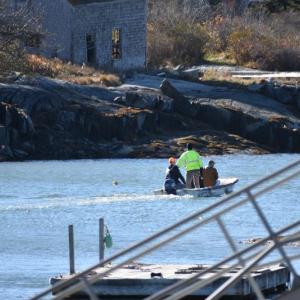 Four Cushing firefighters return to the previous day's location while three more crew members wait on the mainland for a scene report. (Photo by Sarah Thompson)