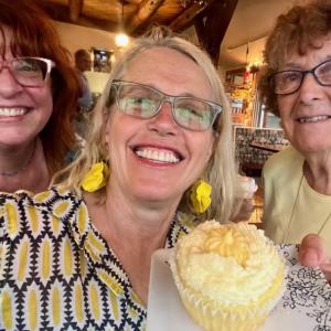 L-r: Christine Buckley, Patrisha McLean, and Mary Lou Smith enjoy a yellow taste treat at the 2024 “Into the Light!” Foodie Festival that raised $28,000 for Finding Our Voices. (Photo courtesy Finding Our Voices)