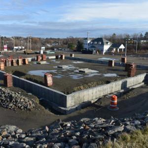 Foundation and underground infrastructure are growing at 198 Old County Road, in Thomaston. The proposal, now two years old, states that Starbucks wishes to fill one of the suites. (Photo by Sarah Thompson)