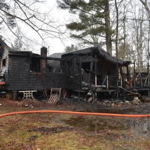 No injuries were reported at a morning house fire at 20 Mass Pike Lane. (Photo by Sarah Thompson)
