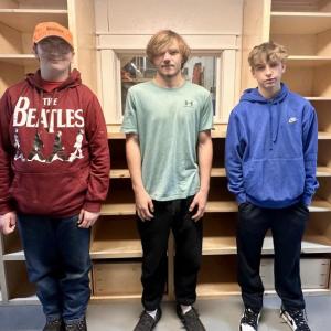 WCTC’s Carpentry students Christian Moody and Josiah Miller from Mount View, and Jacob Bragdon from Searsport, show off the shelving they built for the school's new and expanded clothing closet. (Photo courtesy Waldo County Technical Center)