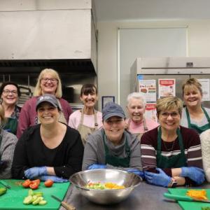 Saco Meal Program. (L to R, Back Row): Suzanne Nason, Carmen Gawronski, Christine Perrault, Dorothy Schlueb, Melanie Lee. (L to R, Front Row): Ginger Grantham, Meg Palmer, Dawn Drown, Denise McIntyre, Judy Hurrell. (Photo courtesy Saco & Biddeford Savings Institution)