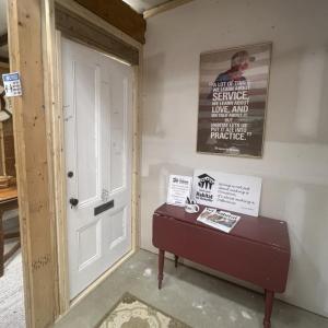 The public is invited to visit the memorial and sign and pay tribute to President Carter and his enduring impact. The memorial will remain on display inside Midcoast Habitat ReStore. (Photo courtesy Midcoast Habitat for Humanity)