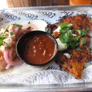 A fish taco and a Beer-ia grilled beef taco. Photo by Kay Stephens