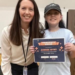 Aubree Joynt receives the Principal’s Award from Principal Ainslee Riley. (Photo courtesy Thomaston Grammar School)