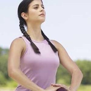 Woman breathing in