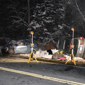 Fire Dept. headlamps illuminate the scene of a two-vehicle crash in Washington. (Photo by Sarah Thompson)