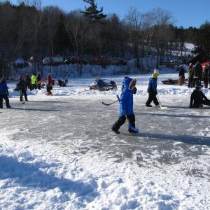 Kids playing hockey Photo by Kay Stephens