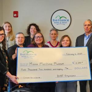 Bar Harbor Bank & Trust presents a donation from the Bank’s Casual for a Cause program to Maine Maritime Museum. Pictured L-R: Amanda Pleau, Marketing & Communications Manager at Maine Maritime Museum; Julianna Preston, Group Tour Coordinator at Maine Maritime Museum; Carlyn Adams, Membership & Database Coordinator at Maine Maritime Museum; Rebecca Roche, Chief Advancement Officer at Maine Maritime Museum; Chelsea Lane, Director of Visitor Experiences at Maine Maritime Museum; Andrea Headley, Develop