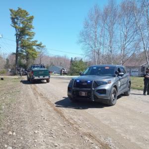 The property in question is not visible from the road block. (Photo by Sarah Thompson)