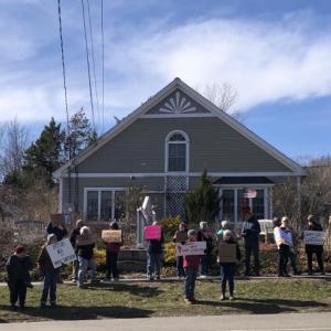 a crowd of library supporters in front of the Waldoboro Public Libraryy