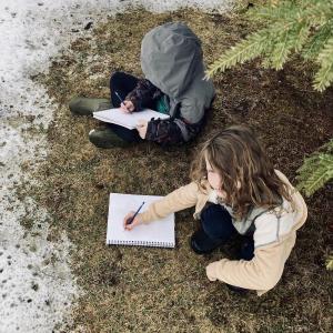 Students at Riley School record observations in their field journals. (Photo courtesy Friends of Maine Coastal Islands National Wildlife Refuge)