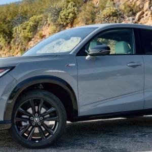 The fourth and newest member of Acura’s SUV lineup is the stylishly sculpted ADX, more or less an RDX that was left in the dryer longer. It’s a subcompact but, like all Hondas and Acuras, the ADX is somehow larger on the inside than the outside. This color is Solar Silver Metallic. The fourth and newest member of Acura’s SUV lineup is the stylishly sculpted ADX, more or less an RDX that was left in the dryer longer. It’s a subcompact but, like all Hondas and Acuras, the ADX is somehow larger on the inside than the outside. This color is Solar Silver Metallic.