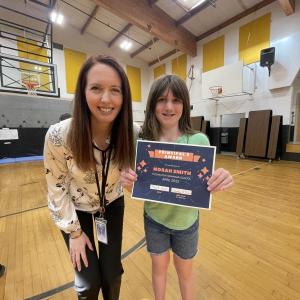Norah Smith receives the Principal’s Award from Mrs. Riley. (Photo courtesy Thomaston Grammar School)