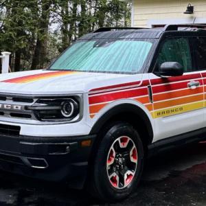 There’s no losing this one in a parking lot. This is Ford’s Free Wheeling graphics package applied over Oxford White, complemented by 17-inch Race Red painted wheels. For 2025 the Bronco Sport gets more standard driver-assistance features, including adaptive cruise control, some appearance tweaks and an array of off-road-focused options. 