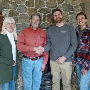 Judy and Sam Smith with Taylor and Lauren Benzie. The Benzies acquired Smith and May, Inc., from the Smiths April 25. (Photo courtesy Midcoast Chimney and Masonry) Judy and Smith Smith with Taylor and Lauren Benzie