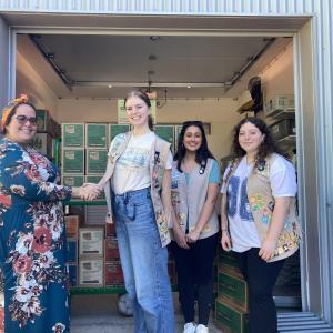 Ariel at AIO receiving cookies from Morgan and Nataly of 191 and Sophia Juliette of Knox. (Photo courtesy Trina Schroeder)