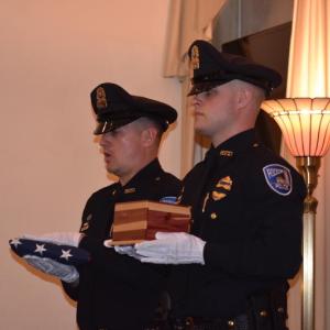 A two-person Police Color Guard made up of Rockland police officers formally presented an American flag and the urn to the Davis Family. (Photo by Sarah Thompson)