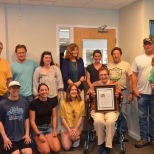 The family of James Annis, with his wife, Linda, seated in the center; children Elizabeth, Becky and Patrick, their spouses and children and grandchildren, and gathered at the Rockport Town Office May 30 to honor the memory of Jim, who was honored in the 2025 Annual Rockport Town Report. Back left to right: Paul Boetsch , Finn Bradenday, Abby Annis, Elizabeth Boetsch, Becky Johnson, Parker Johnson, Patrick Annis, Norah Bradenday, and Kerry Keefe. Front row left to right: James Annis, Alley Johnson, Hannah Berta, and Linda Annis.
(Photo by Lynda Clancy) c