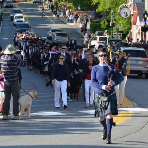 Here they come! The Camden Hills Regional High School Class of 2025 descends Main Street in downtown Camden for its baccalaureate march through town, and up to the First Congregational Church for a nondenominational service June 2. (Photo by Lynda Clancy) c