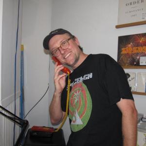 Justin Miller still has vinyl records and a landline. Photo by Kay Stephens