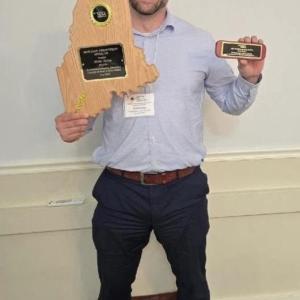 Mike Felton and his award for outstanding educational leadership and dedication to Maine’s children. (Photo courtesy Kristin Falla)
Mike Felton and his award for outstanding educational leadership and dedication to Maine’s children. (Photo courtesy Kristin Falla)