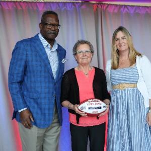 Patriots Pro Football Hall of Famer Andre Tippett (far left) and Gillette’s VP of Communications & Community Affairs, Global Grooming, Kara Buckley congratulate Cheryl Ramsay from NAMI Maine for being selected as a 2025 Myra Kraft Community MVP Award winner. During the June 3 luncheon, the Kraft family, the Patriots Foundation and Gillette awarded $275,000 in grants to 26 New England nonprofits. NAMI Maine received a $10,000 grant in honor of Cheryl’s volunteer efforts. (Photo courtesy Eric J. Adler/New Eng