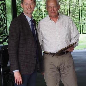 PAWS Executive Director Casey Baugher and Alvin Chase of Eastern Tire. (Photo courtesy PAWS Animal Adoption Center)