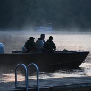 Maine Wardens leave the dock as the sun rises. (Photo by Sarah Thompson)