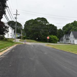 Fire Station on the left. An empty lot on the right has been used as overflow for apparatus in the past. (Photo by Sarah Thompson)