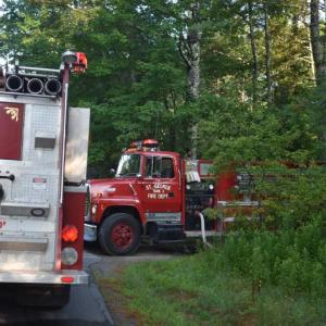 A St. George tanker truck idles in the driveway of 47 Turkey Cove Road, in St. George, in response to an early morning fire call at that location. (Photo by Sarah Thompson) 