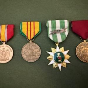 (l-r): Medals received for completing boot camp, time served in Vietnam during the war, and for honorable discharge. (Photo courtesy Danny Swindler/Dawn Bailey)