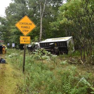 A box truck from the insulation division of a building company landed on its side just inside Knox County, a few feet up from Washington Auto Parts. (Photo by Sarah Thompson)
