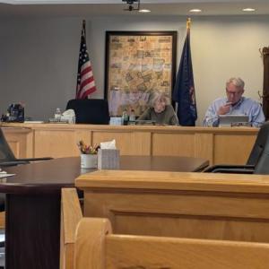 Commissioners Betty Johnson (center) and Kevin Kelley (right) have struggled to explain what caused a $580,000 hole in the jail budget and how it was filled. Photo by Daniel O’Connor. waldo county commissioners during a meeting.