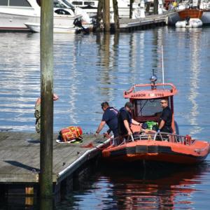 Rockland EMS waits for a stretcher after transporting a patient off the Breakwater, Sept. 16. in the early afternoon. (Photo by Sarah Thompson)