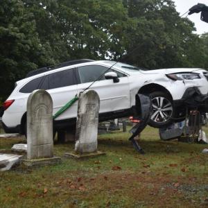 Front of car being raised off the ground